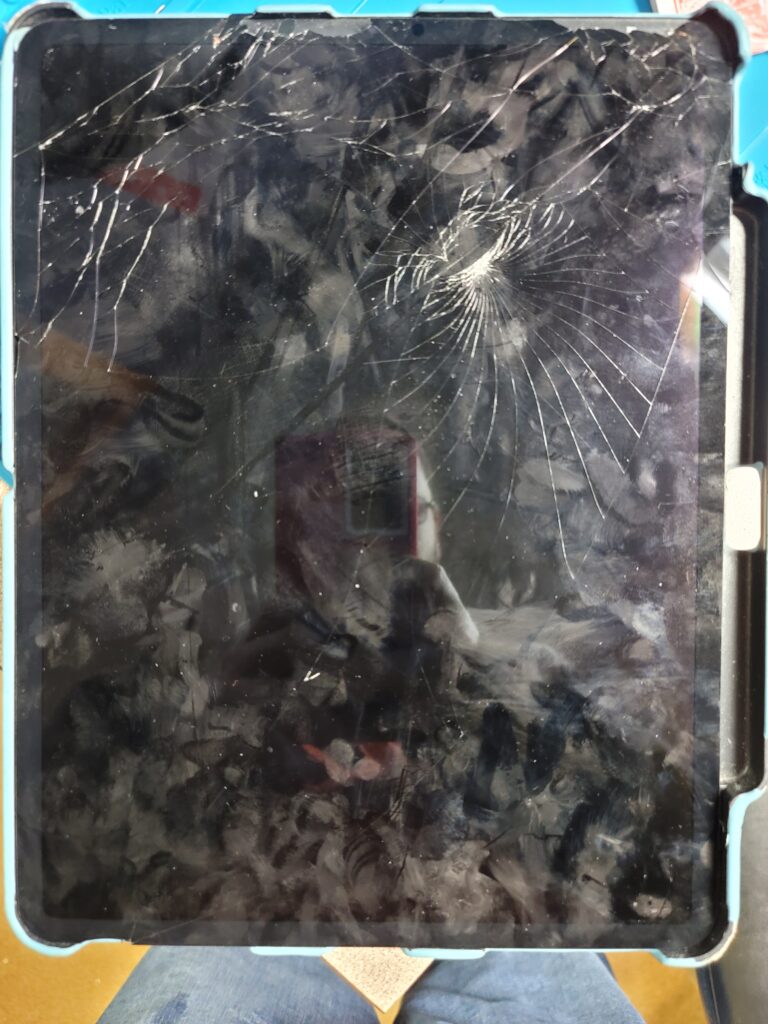 Tablet with severely cracked and shattered screen